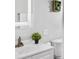 Bathroom vanity with white cabinets and a modern faucet at 9300 Grove St, Westminster, CO 80031