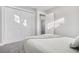 Spacious bedroom with neutral walls and carpeting at 9300 Grove St, Westminster, CO 80031