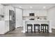 Updated kitchen featuring white cabinets and stainless steel appliances at 9300 Grove St, Westminster, CO 80031