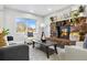 Living room with stone fireplace and comfy seating at 9300 Grove St, Westminster, CO 80031