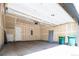 Spacious two-car garage with freshly painted walls and an automatic door at 5630 W 11Th Pl, Lakewood, CO 80214