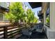 Private patio shows off outdoor seating and views of surrounding community at 5630 W 11Th Pl, Lakewood, CO 80214