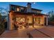 Outdoor patio with hot tub, fireplace, and lounge furniture perfect for entertaining at 2600 S Adams St, Denver, CO 80210