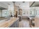 Luxurious bathroom featuring marble countertops, a soaking tub, and decorative mirrors at 2600 S Adams St, Denver, CO 80210