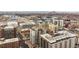 Aerial view showcases downtown cityscape with surrounding buildings and urban landscape at 2 N Adams St # 108, Denver, CO 80206
