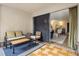 Charming balcony with comfortable seating, offering a seamless transition to the indoor living space at 2 N Adams St # 108, Denver, CO 80206