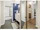 Stylish bathroom featuring modern vanity, sleek fixtures, and a shower/tub with a glass door at 2 N Adams St # 108, Denver, CO 80206