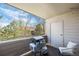 Balcony with grill and view of trees at 8378 S Upham Way # B305, Littleton, CO 80128
