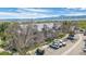 Apartment building exterior with balconies, trees, and parking in a well maintained community at 8378 S Upham Way # B305, Littleton, CO 80128