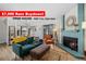 Inviting living room boasts a fireplace, comfortable seating, and access to outdoor space at 8378 S Upham Way # B305, Littleton, CO 80128