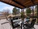 Back deck with seating area and views of the open space at 7858 Oban Ct, Lone Tree, CO 80124