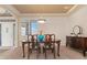 Elegant dining room with a classic table, chairs, and decorative accents at 7858 Oban Ct, Lone Tree, CO 80124