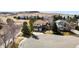 Charming two-story home on a cul-de-sac with an attached two-car garage and well-manicured lawn at 7858 Oban Ct, Lone Tree, CO 80124