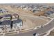 Expansive aerial view of a residential neighborhood with modern homes and open spaces at 5351 Warrior St, Frederick, CO 80504