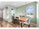 Inviting dining room with ample natural light and seating for six at 5351 Warrior St, Frederick, CO 80504