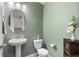 Charming powder room with modern fixtures and stylish decor at 5351 Warrior St, Frederick, CO 80504
