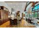 Gourmet kitchen with island, stainless steel appliances, and high ceilings with exposed wood beams at 219 Glen Eagle Loop, Breckenridge, CO 80424