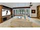 Entertainment-ready living room has built-in media center and lots of natural light at 219 Glen Eagle Loop, Breckenridge, CO 80424