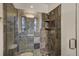 A shower featuring decorative tile and glass door at 219 Glen Eagle Loop, Breckenridge, CO 80424