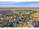 Bird's eye view of a residential neighborhood with mature trees and manicured lawns at 6317 Ruby Hill Dr, Erie, CO 80516
