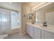 Stylish bathroom featuring updated fixtures, a shower-tub combo, and modern vanity at 6317 Ruby Hill Dr, Erie, CO 80516