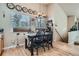 Cozy dining area featuring a stylish chandelier and bright natural light at 13495 Shiloh Rd, Conifer, CO 80433