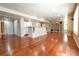Spacious finished basement featuring kitchen area with bar, hardwood floors and tons of space at 18112 E Dorado Ave, Centennial, CO 80015
