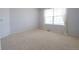 Carpeted bedroom with window bringing in natural light at 18112 E Dorado Ave, Centennial, CO 80015