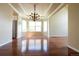 Elegant dining room featuring a chandelier and hardwood floors at 18112 E Dorado Ave, Centennial, CO 80015