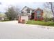 Charming two-story home with a well-manicured lawn and brick accents at 18112 E Dorado Ave, Centennial, CO 80015