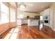 Eat-in kitchen featuring island, stainless appliances, and plenty of sunlight at 18112 E Dorado Ave, Centennial, CO 80015