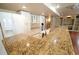 Finished basement area featuring kitchen with granite counters, island and lots of cabinet space at 18112 E Dorado Ave, Centennial, CO 80015