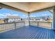 Covered deck featuring an open-air view of the community's blue sky and newly-constructed residences at 680 Tubman Dr, Elizabeth, CO 80107