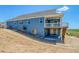 Two-story home showcases a walk-out basement, composite siding, and a spacious elevated rear deck at 680 Tubman Dr, Elizabeth, CO 80107