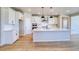 Bright kitchen featuring a center island with seating and stainless steel appliances at 680 Tubman Dr, Elizabeth, CO 80107