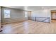 Spacious room with hardwood floors, neutral walls and plenty of natural light at 680 Tubman Dr, Elizabeth, CO 80107