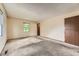 Bright bedroom with a large window providing natural light and plain walls at 1431 S Chambers Cir, Aurora, CO 80012