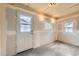 Bright bonus room with natural light, ready to be updated and transformed into your dream space at 1431 S Chambers Cir, Aurora, CO 80012