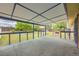 Outdoor patio with blue railing overlooks the yard, perfect for relaxing and entertaining guests at 1431 S Chambers Cir, Aurora, CO 80012