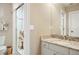 Bathroom featuring granite countertops, a glass enclosed shower and modern fixtures at 145 Capulin Pl, Castle Rock, CO 80108