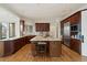 Gourmet kitchen with stainless steel appliances, a large island, and ample cabinet space at 145 Capulin Pl, Castle Rock, CO 80108