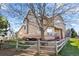 Charming backyard with a patio, fire pit, and wooden fence surrounding the property at 4236 Frederick Cir, Longmont, CO 80503