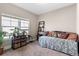Bedroom with daybed, decorative pillows and lots of natural light at 4236 Frederick Cir, Longmont, CO 80503