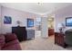Bedroom with purple walls, carpet flooring, and walk-in closet at 4236 Frederick Cir, Longmont, CO 80503