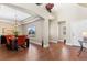 Bright dining room with large windows, tray ceilings, and stylish furnishings at 4236 Frederick Cir, Longmont, CO 80503