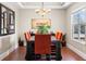 Elegant dining room featuring modern lighting, a large window, and stylish decor at 4236 Frederick Cir, Longmont, CO 80503