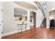 Elegant foyer featuring beautiful tile flooring, staircase, and arched openings at 4236 Frederick Cir, Longmont, CO 80503