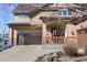 Attractive two-story home with a three-car garage, charming porch, and well-kept landscaping at 4236 Frederick Cir, Longmont, CO 80503