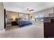 Spacious main bedroom with carpeted floor, ceiling fan, and lots of natural light at 4236 Frederick Cir, Longmont, CO 80503