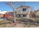 Exterior: View of backyard, fence, and house at 1123 S Biscay St, Aurora, CO 80017